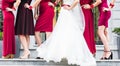 Bride with bridesmaids outdoors on the wedding day Royalty Free Stock Photo