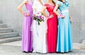 Bride with bridesmaids outdoors on the wedding day Royalty Free Stock Photo