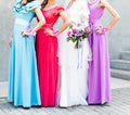 Bride with bridesmaids outdoors on the wedding day Royalty Free Stock Photo