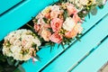 Bride and bridesmaids Wedding bouquets with roses and other flow