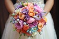 A bride with a bright wedding bouquet