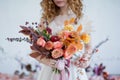 Bride with colorful autumn bouquet Royalty Free Stock Photo