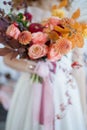 Bride with colorful autumn bouquet Royalty Free Stock Photo