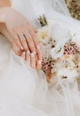 bride conceptual morning flowers white dress hands Royalty Free Stock Photo