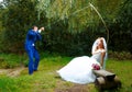 Bride cought a groom for her with a fishing rod, Royalty Free Stock Photo