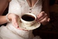 The bride with a cup of coffee Royalty Free Stock Photo