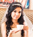 Bride with a cup of coffee Royalty Free Stock Photo