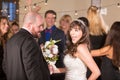 Bride Dancing with Handsome Man at Reception Royalty Free Stock Photo