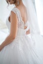 Bride in elegant classic wedding dress and stockings. Royalty Free Stock Photo