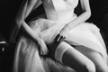 Bride in elegant classic wedding dress and stockings. Morning of the bride Royalty Free Stock Photo