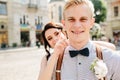 Bride embraces bridegroom Royalty Free Stock Photo