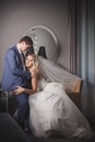 Bride embraces bridegroom