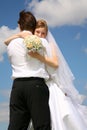 Bride embraces fiance Royalty Free Stock Photo