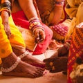 Bride feet coloring ceremony, a Hindu wedding ritual,