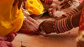 Bride feet coloring ceremony, a Hindu wedding ritual, Royalty Free Stock Photo