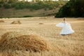 Bride in field Royalty Free Stock Photo