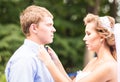 The Bride Fixing Bow Tie of groom Royalty Free Stock Photo