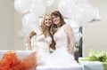 Bride And Friend Standing Together At Bridal Shower