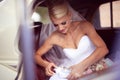 Bride geting off the car
