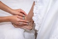 Bride getting ready, dressing, on her wedding day Royalty Free Stock Photo