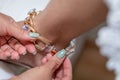 Bride getting ready, dressing, on her wedding day Royalty Free Stock Photo