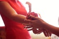 Bride giving flowers to her bridesmaid