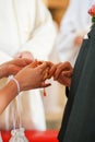 Bride giving ring to groom in wedding Royalty Free Stock Photo