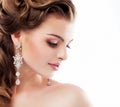Pure Beauty. Aristocratic Profile of smiling Lady with Glossy Diamond Earrings. Femininity & Sophistication Royalty Free Stock Photo