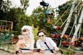 Bride and groom in amusement park Royalty Free Stock Photo