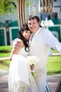 Bride and groom about art ironwork Royalty Free Stock Photo