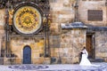 The bride and groom on the background of the famous astronomical