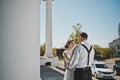 The bride and groom on the background of white columns 3912. Royalty Free Stock Photo