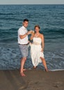 Bride and Groom on the Beach Royalty Free Stock Photo