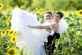 Bride and groom in a beautiful light holding hug