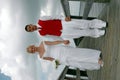 Bride and Groom on boardwalk Royalty Free Stock Photo