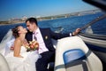 Bride and groom on the boat Royalty Free Stock Photo