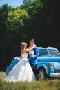 Bride and Groom by Cabriolet Royalty Free Stock Photo