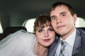 Bride and groom in a car in a wedding Royalty Free Stock Photo