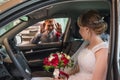 Bride and groom in a car in a wedding Royalty Free Stock Photo