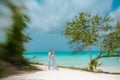 Bride and groom on a Caribbean beach, Lensbaby artistic blur, Royalty Free Stock Photo