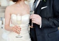 Bride and groom with champagne glass at the wedding ceremony Royalty Free Stock Photo