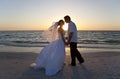 Bride & Groom Couple Kissing Sunset Beach Wedding Royalty Free Stock Photo