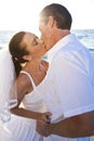 Bride & Groom Couple Kissing Sunset Beach Wedding Royalty Free Stock Photo