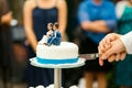 Bride groom cutting wedding cake Royalty Free Stock Photo