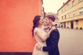 Bride and groom embracing in the city Royalty Free Stock Photo