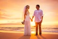 Bride and Groom, Enjoying Amazing Sunset on a Beautiful Tropical Royalty Free Stock Photo