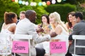 Bride And Groom Enjoying Meal At Wedding Reception Royalty Free Stock Photo