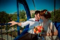 Bride and groom in the Ferris wheel Royalty Free Stock Photo