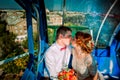 Bride and groom in the Ferris wheel Royalty Free Stock Photo