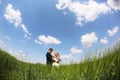 Bride and groom on the fields Royalty Free Stock Photo